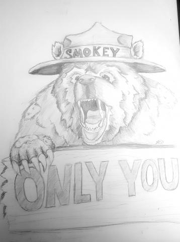 Bear wearing a hat, standing behind a sign that says "only you"